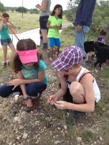Ramsey and Sydney digging for arrowheads